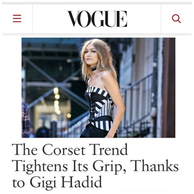 Vogue article showing Gigi Hadid wearing a black and white corset.