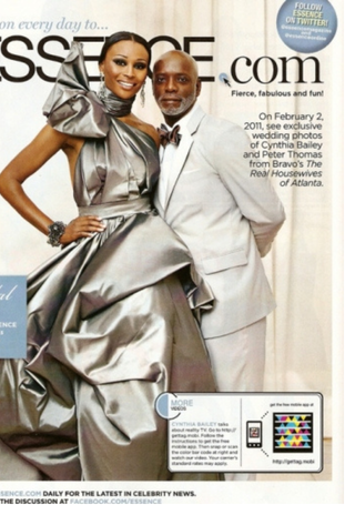 Essence wedding feature showing Cynthia Bailey in a sculptural silver gown beside Peter Thomas.
