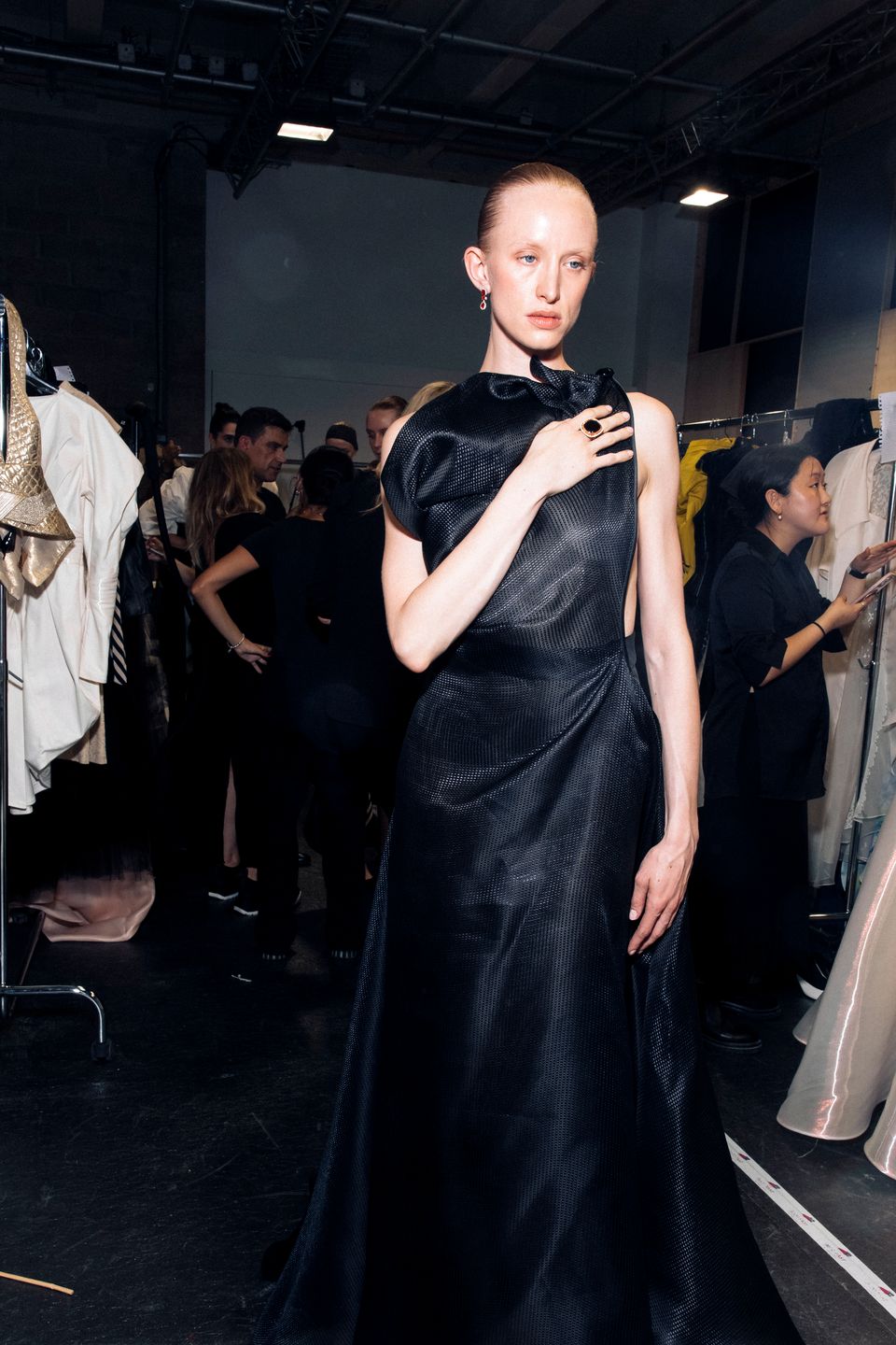 Model in a black evening gown at the venue
