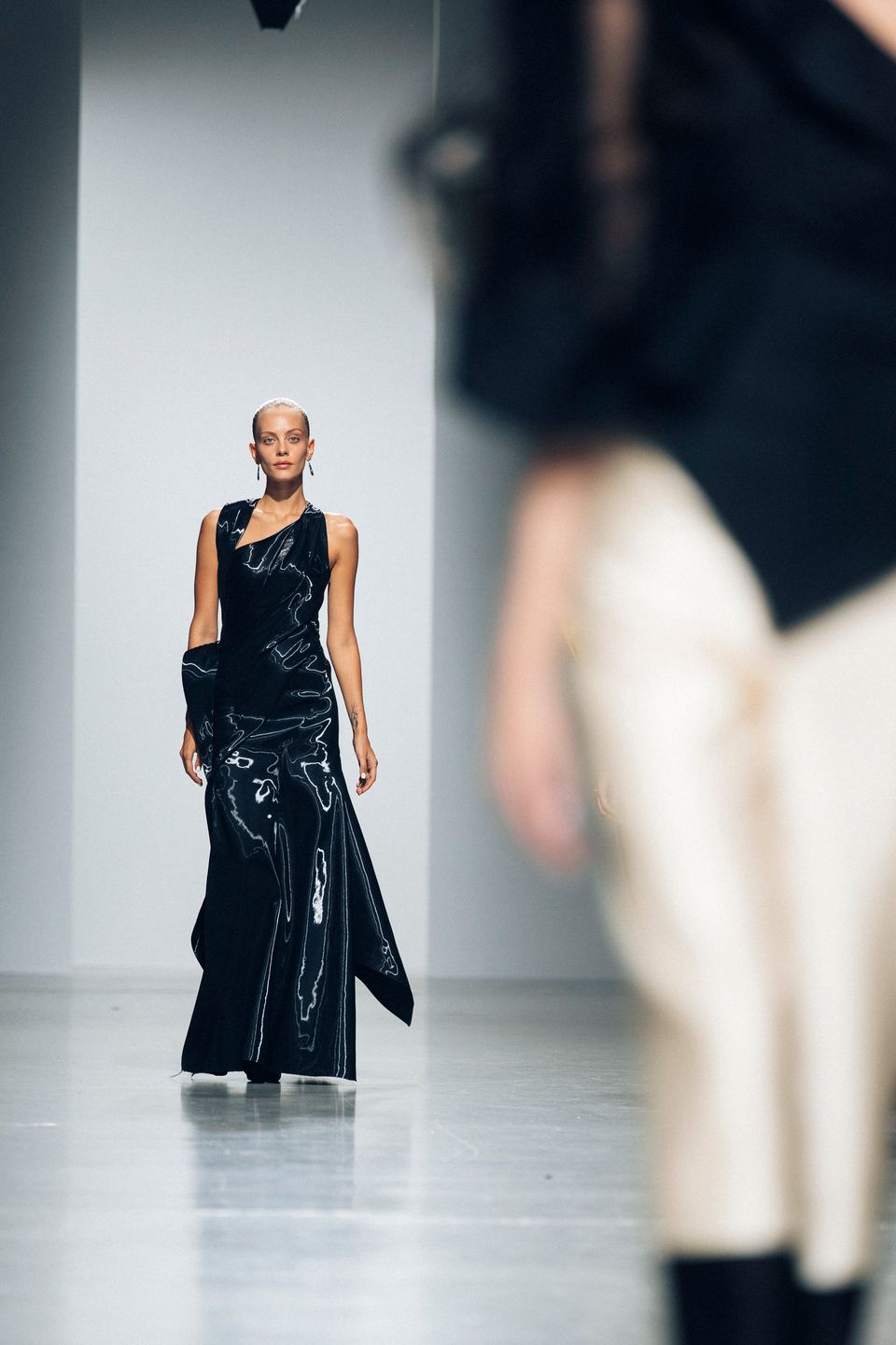 Black evening gown on the Paris runway